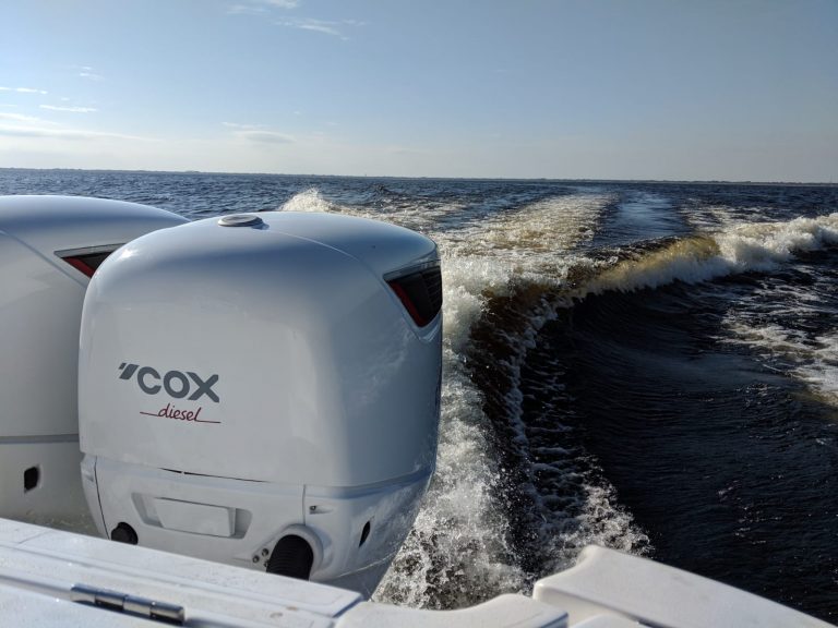 two CXO 300 engines driving through water image