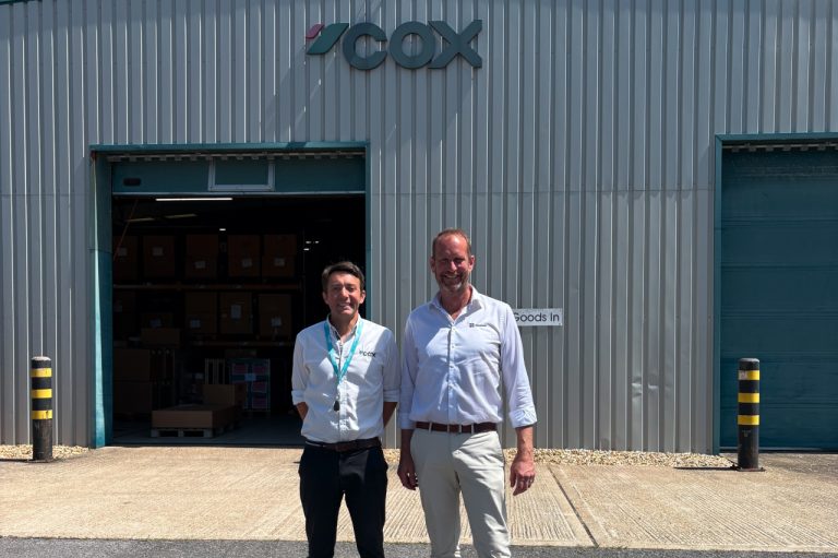 Cox Marine CEO George Bramley with Dpower CEO Peter Nauwerck outside the Cox Marine facility in Shoreham-by-Sea, UK.